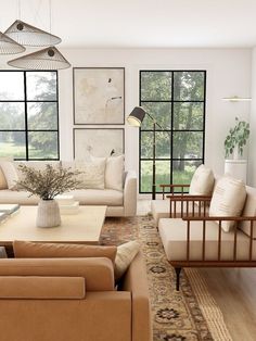 a living room filled with lots of furniture next to large windows and a rug on the floor