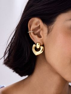 Introducing the Geraldine Earrings: bold, beautiful, and impossible to ignore statement earrings. These large, chunky heart door knocker earrings make a statement with every step, adding a playful yet fierce touch to your style. Perfect for those who love to make a statement, regardless if it's for everyday looks or for elevated occasions. Chic Chunky Earrings, Elegant Chunky Earrings For Gift, Chic Metal Heart Earrings For Pierced Ears, Denim Pumps, Earrings Bold, Bold Statement Jewelry, Building Self Esteem, Confidence Tips, Door Knocker