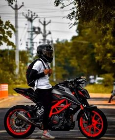 a person sitting on top of a motorcycle