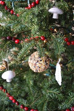 a christmas tree with ornaments hanging from it