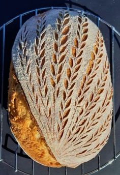 a loaf of bread sitting on top of a metal rack