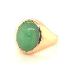 For Sale on 1stDibs - Oval shape cabochon green jade ring, bezel set in 14k yellow gold. The Jade measures approximately 17.06 mm x 12 mm x 6.02 mm with an estimated weight Formal Oval Jade Emerald Ring, Classic Green Emerald Oval Cabochon Ring, Classic Green Oval Cabochon Emerald Ring, Green Oval Cabochon Signet Ring For Formal Occasions, Classic Green Oval Cabochon Signet Ring, Formal Green Oval Cabochon Signet Ring, 14k Gold Emerald Ring With Oval Cabochon, 14k Gold Oval Cabochon Emerald Ring With Polished Finish, Formal Green 14k Gold Dome Ring