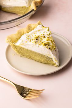 a piece of pie sitting on top of a white plate