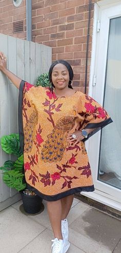 "Ankara print mix with contemporary fabric to create a loose and light dress, perfect for summer. Perfect for date night or when 'chic' is the dress code! Unlined Fit: loose Length: knee Sleeve: loose African print Available for immediate shipping You can order custom size to ensure good fitting, stated below is our size chart and if none of it works for you, kindly send in your measurements, we will work with it to deliver good fit. Size Description Size 8/10 Bust 36\" Waist 30\" Hip 40\" Size 12/14 Bust 40\" Waist 36\" Hip 44\" Size 16/18 Bust 44\" Waist 40\" Hip 48\" Check your measurements before placing your orders. CARE INSTRUCTIONS: Hand wash cold. DO NOT BLEACH. Hang dry. Press with cool iron on the wrong side only. Colour may vary slightly due to lighting." Patterned Dresses With Kimono Sleeves For Summer, Spring Patchwork Kaftan, Patterned Dresses With Floral Print And Kimono Sleeves, Patterned Dress With Floral Print And Kimono Sleeves, Mixed Print Dresses For Beach, Mixed Print Beach Dresses, Printed Kaftan For Daywear, Summer Dress With Batik Print And Kimono Sleeves, Ankara Print