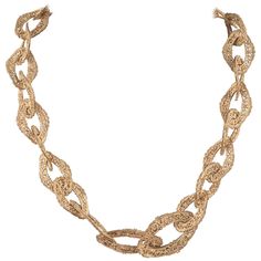 A rare and very decorative 'chain' necklace, very collectable, from Chanel in the early 1960s, made in the Byzantine style, from delicate filigree metal links, that create a graduated necklace. A very iconic style, and simply marked in the old way, 'CHANEL' (in block letters), this would look striking worn singly, or with a rope of Chanel pearls, or another Chanel chain/rope necklace. Chanel herself always wore a mixture of ropes, and suggested it as a stylish and chic way to wear her timeless p Crucifix Necklace, Bronze Makeup, Elegante Y Chic, Chanel Chain, Graduation Necklace, Chanel Pearls, Link Chain Necklace, Gold Filigree, Rope Necklace