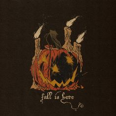 a black shirt with an image of a jack - o'- lantern on it