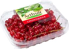 a plastic container filled with lots of cherries