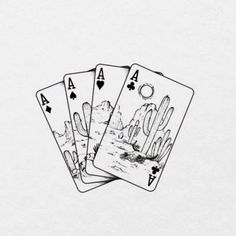 three playing cards with cactus designs on the front and back, all in black ink