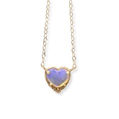 Gold & Stone Necklace - There is love in your heart; tap into into with this stunning, one-of-a-kind gold necklace that boasts a heart-shaped, gemstone-quality opalized wood element that sparkles with blue inclusions. It closes with a lobster clasp. Valentine's Day Opal Heart Pendant Necklace, Wood Element, Opalized Wood, Gold Stone Necklace, Opal Necklace Gold, Professional Gifts, Artful Home, Gold Stone, Creative Jewelry