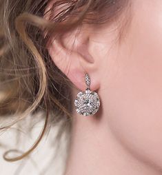 Complement your vintage bridal look with these dainty earring drops decorated with Cubic Zirconia pave crystals. Complete your look with an elegant vintage-inspired bun. Available in: 18K White Gold / Gold / Rose Gold over base metal Cubic Zirconia pave crystals Hypoallergenic post Height: 1in (2.5cm) x Width: 0.6in (1.6cm) #E142 Bridal Earrings Silver, Pendant Necklace Silver, Bridal Event, Jewelry Bridal, Vintage Bridal, Silver Drop Earrings, Dainty Earrings, Bridal Looks, Bridal Earrings