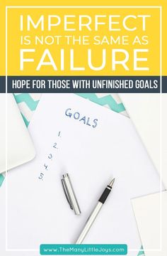 a desk with a pen, notebook and calculator next to it that says imperfect perfect is not the same as failure hope for those uninshed goals