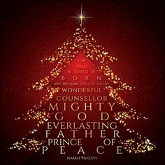 a christmas tree with words written on it in gold and red, against a dark background