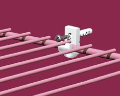 two white pipes connected to each other on a red background with pink piping in the middle