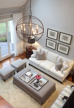 a living room filled with furniture and decor