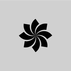 a black and white flower on a gray background