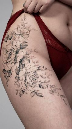 a woman's stomach with flowers on it