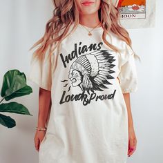 Show your love of the game with this vintage style Loud and Proud Indians mascot design on the popular comfort colors tee. This is a great school spirit shirt for the game and everyday wear! It makes the perfect mom gift or shirt for the coach's wife! This garment-dyed t-shirt is made with 100% ring-spun cotton. The soft-washed, garment-dyed fabric brings extra coziness to your wardrobe while the relaxed fit makes it an excellent daily choice. The double-needle stitching throughout the tee makes Cheer Pins, Indian Logo, Mascot Shirt, Football Cheer, School Spirit Shirts, Spirit Shirts, School Pride, Mama Shirts, Game Day Shirts