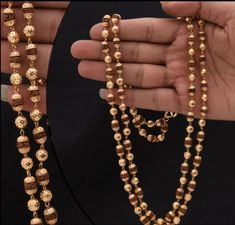 This distinctive gold plated Rudraksha Mala is handmade with high quality brass beads. It is a perfect accessory for men looking for a unique and religious piece to add to their collection. The Rudraksha beads add a touch of spirituality to this golden mala, making it a must-have for any fashion-forward man. Mala Dimension Height:61 cm (24.02 inch) Width:12 mm (1.2 cm) Depth:6 mm (0.6 cm) Other Specification Weight:39 Gram Size:Fixed Lock Type:M/W Hook Color:Golden Material:Brass, Rudraksha Surface Finish:Shining, Textured Occasion:Festival, Marriage / Wedding / Engagement, Birthday, Gift, Photography, Religious/Temple Style of Jewellery:Religious, Bead, Handmade Luxury Temple Jewelry Chandbalis For Diwali, Luxury 22k Gold Danglers For Diwali, Luxury Temple Jewelry Danglers For Diwali, Gold Dual-tone Temple Necklace For Puja, Temple Jewelry Gold Beads Mala Gift, Gold Polished Beads Jewelry For Diwali, Gold Necklaces With Polished Beads For Diwali, Temple Jewelry Gold Beads Mala For Festivals, Temple Jewelry Mala With Gold Beads For Festivals