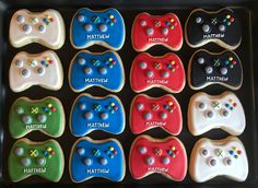 decorated cookies in the shape of video game controllers