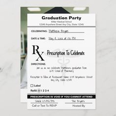 a graduation party ticket sitting on top of a table