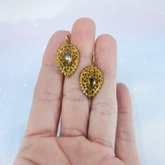 "These earrings are beyond exquisite, BEYOND. I encourage you to zoom way in on the pics and look at the absolutely incredible metal work on these beauties, it is phenomenal. Made circa 1850, very possibly earlier, these earrings are done in the pendeloque style popularized in the mid-1700's. Bezel set foil-backed citrines sit atop hand sawn scrolling metalwork that is full of fine detail. And as if things couldn't get any better, these are also day/night! And they're not just day/night with two Antique Engagement, Victorian Rings, Bird Earrings, Antique Earrings, Victorian Jewelry, Antique Rings, Citrine, Beautiful Earrings, Vintage Rings