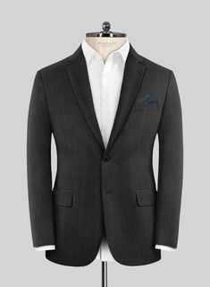 If you're seeking for a suit to add gravitas to your career prospects, consider our Reda Cashmere Dark Gray Chalkstripe Wool Suit. Crafted from a luxurious wool blend with cashmere, its chalkstripe pattern on dark gray fabric introduces an element of intrigue to your innate charm, making this suit a perfect choice for ambitious professionals and formal evening occasions where you aim to inject a bit of flair.  Look Includes    Reda Cashmere Dark Gray Chalkstripe Wool Fabric   Two Button Jacket S