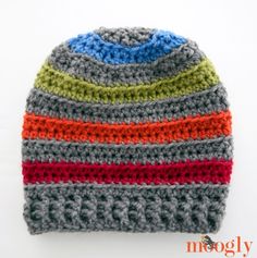 a crocheted hat with multicolored stripes