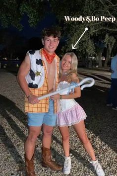 a man and woman are dressed up as woody and daisy from the movie toy story