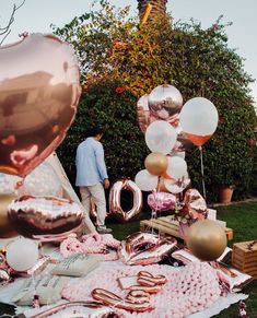 some balloons and other items on the ground