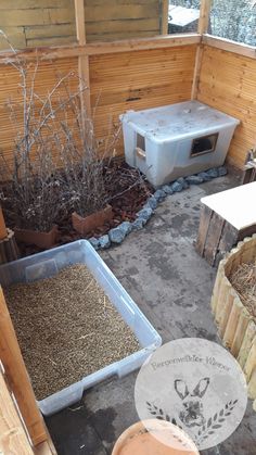 an outdoor area with several different types of plants and animals in the yard, including one for cats