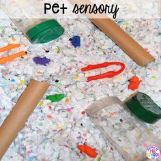 a pile of plastic toys with the words how to make a pet sensory on it