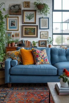 a living room filled with furniture and lots of plants