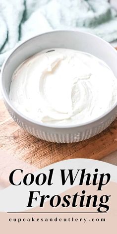 a bowl of whipped cream sitting on top of a wooden cutting board with the words cool whip frosting