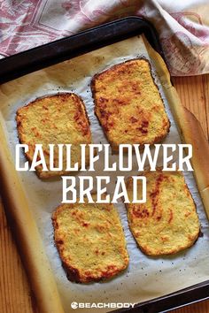 four pieces of bread sitting on top of a baking sheet with the words cauliflower bread