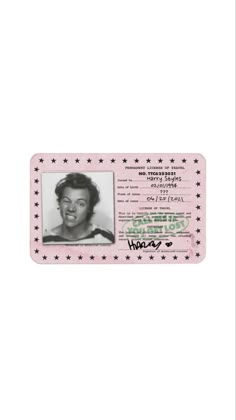 an id card with a woman's face and stars on the front, in pink