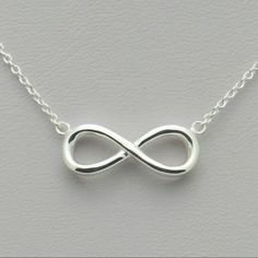 .925 Sterling Silver Infinity Necklace. Delicate Chain Measures 16" With Two 1" Extenders Attached. Pendant Measures Approximately 3/4" L, 3/8" W. Silver Infinity Necklace, Infinity Necklace Silver, Infinity Necklace, Jewelry Sterling Silver, Delicate Chain, Sterling Silver Jewelry, 925 Sterling Silver, Necklaces, Sterling Silver