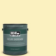 a brown paint with the words behr premium plus ultra on it's side