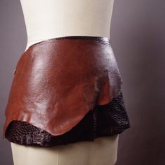 This belt is handmade from thick  brown high quality genuine leather and dark brown thin genuine leather. The straps are made from leather as well. It will fit  ( S - M ). (4/6/8/10). Dress form is US size -6- It will fit up to 36 inches waist.  Check out my other genuine and faux leather belts! Thank you for looking. Here is the link! https://www.etsy.com/shop/Suniq?ref=seller-platform-mcnav&section_id=23086669 FREE SHIPPING in the STATES by First Class Mail with a Tracking info. See All One-of-a-Kind Items - Leather Belts - Clothing - Accessories: www.etsy.com/shop/Suniq Brown Leather Wrap Skirt, Cloth Belt, Belt Brown, Wrap Belt, Belt Leather, Faux Leather Belts, Brown Leather Belt, Skirt Belt, M 4