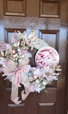 a wreath is hanging on the front door