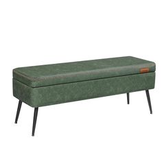 a green bench sitting on top of a metal frame footstool in front of a white background