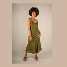 This elegant simple slip dress is made from double-layered fine cotton voile. Bias cut with a central seam it is a flattering feminine shape.  With spaghetti straps and a corseted back, it can be adjusted to different bust sizes and hugs the body shape. Available in 4 different colors  Beige  Olive Green  Teal Blue  Maroon  and 5 sizes from UK Xs to XL  XS - Uk size 8  S -  Uk size 10  M - Uk size 10 - 12  L  - Uk size 12 - 14  XL - UK size  14 - 16 For more natural clothing please see my shop  www.etsy.com/shop/elfnfelt Green Slip Dress With Spaghetti Straps And Bias Cut, Green Bias Cut Slip Dress With Spaghetti Straps, Summer Dresses With Bias Cut, Green Bias Cut Slip Dress For Summer, Green Bias Cut Midi Dress For Summer, Green Bias Cut Dress For Summer, Cotton Slip Dress, Athena Dress, Lagenlook Dress