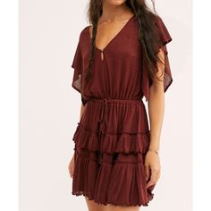 Free People Beach Harper Red Burgundy Mini Dress Tiered Mini Dress In A Soft Ribbed Style With Cascading Ruffled Sleeves. Casual, Laid-Back Beach Vibe! - Burgundy Maroon Brick Red - Buttoned Keyhole Neckline - Adjustable Drawstring Waistband - Ruffled Tiered Skirt - Ruffled Sleeves Materials: Linen, Polyester Size: Medium Condition: New With Tags Measurements: Approx Measurements (Flat) Length 32” Waist 14” Pit To Pit 18.5” Style Profile: Casual Summer Spring Vacation Beach Resort Pool Party Bbq Red Sleeveless Beach Dress With Ruffles, Bohemian Flowy Red Mini Dress, Pool Party Bbq, Bohemian Red Mini Dress With Ruffles, Flowy V-neck Tiered Beach Dress, Free People Beach, Burgundy Mini Dress, Beach A-line Mini Dress With Ruffle Hem, Tiered Mini Dress