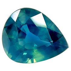 a large blue diamond cut in to shape of a tear shaped stone, on a white background