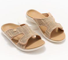 Easy to wear with a slip-on style, these slides are fashioned with an adjustable hook-and-loop closure, arch support, and metatarsal support. From RevitalignTM. Adjustable Slip-on Slippers With Ortholite Insole, Comfortable Open Toe Slides With Arch Support, Beige Slip-on Slides With Arch Support, Comfortable Slide Sport Sandals With Arch Support, Comfortable Adjustable Slides With Ortholite Insole, Adjustable Slides With Ortholite Insole, Adjustable Open Toe Slides With Ortholite Insole, Beige Slip-on Sandals With Arch Support, Beige Open Toe Slides With Arch Support