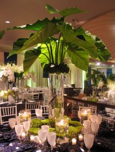 an image of a table set up with flowers and candles for a wedding reception in italy