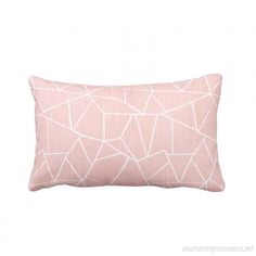 a pink pillow with white lines on the front and back, it has a light pink background