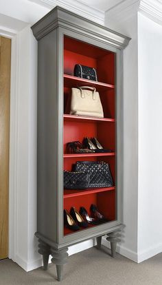 an armoire with several pairs of shoes and purses