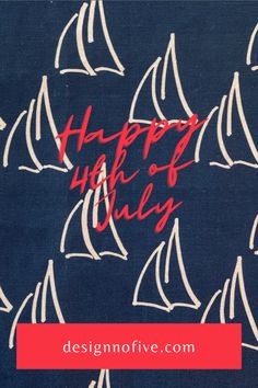 a blue rug with white sailboats on it and the words happy holidays written in red