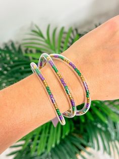 This set of 3 jelly bangle bracelets is perfect for accessorizing any Mardi Gras outfit. Durable and stylish, the bracelets feature a glossy, eye-catching finish that will stand out in any crowd. Mardi Gras Outfits, Mardi Gras Beads, Bangle Bracelet Set, Mardi Gras, Bangle Bracelet, Bracelet Set, Jelly, Bangle Bracelets, Bangles