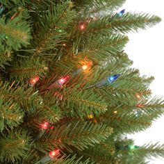 a close up of a christmas tree with lights